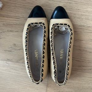 Vintage Chanel flats with gold chain detail trim.